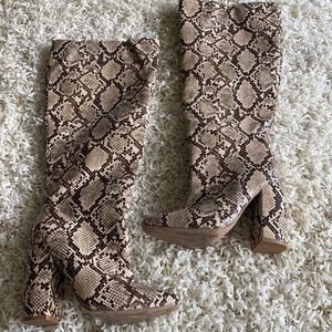 Snakeskin tall boots